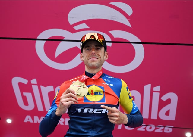 Cycling - Giro d'Italia - Stage 15 - Fiume Veneto to Asiago - Italy - May 25, 2025 Lidl - Trek's Carlos Verona celebrates on the podium after winning stage 15 REUTERS/Jennifer Lorenzini