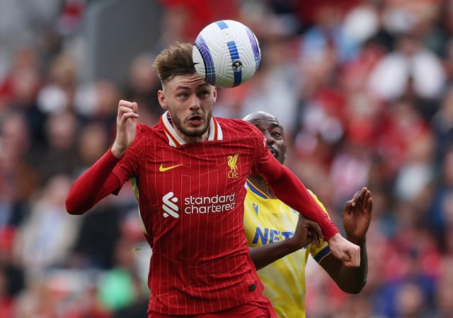 Soccer Football - Premier League - Liverpool v Crystal Palace - Anfield, Liverpool, Britain - May 25, 2025 Liverpool's Conor Bradley in action with Crystal Palace's Jean-Philippe Mateta REUTERS/Phil Noble