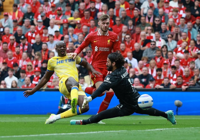 Soccer Football - Premier League - Liverpool v Crystal Palace - Anfield, Liverpool, Britain - May 25, 2025 Crystal Palace's Jean-Philippe Mateta scores their second goal past Liverpool's Alisson Becker before it is disallowed after a VAR review REUTERS/Phil Noble