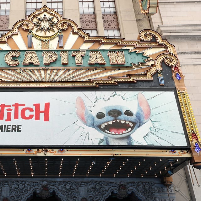 (FILES) The marquee is seen during the world premiere of Disney's live action remake of "Lilo & Stitch" at the El Capitan theatre in Hollywood, California, May 17, 2025. Theaters across North America are enjoying an exceptional Memorial Day holiday weekend, with two new much-anticipated blockbusters bringing in an estimated box office totaling well over $250 million, analysts said on May 25, 2025. (Photo by Michael Tran / AFP) (Photo by MICHAEL TRAN/AFP via Getty Images)