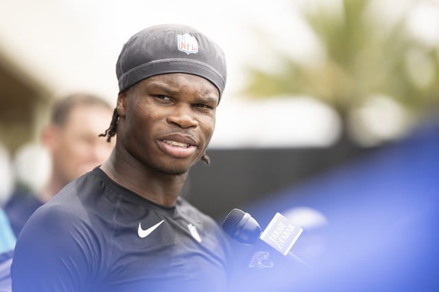 Travis Hunter #12 of the Jacksonville Jaguars speaks to the Media during Jacksonville Jaguars Rookie Minicamp at Miller Electric Center on May 10, 2025 in Jacksonville, Florida.