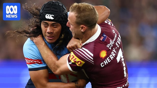Jarome Luai tackled by Daly Cherry-Evans in 2024 State of Origin series.