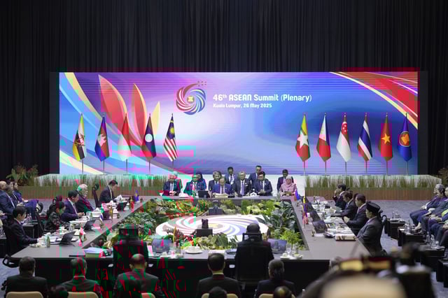 Malaysia's Prime Minister Anwar Ibrahim, center, together with others ASEAN countries leaders attends the plenary session at the Association of Southeast Asian Nations (ASEAN) Summit in Kuala Lumpur, Malaysia, Monday, May 26, 2025. (AP Photo/Vincent Thian)