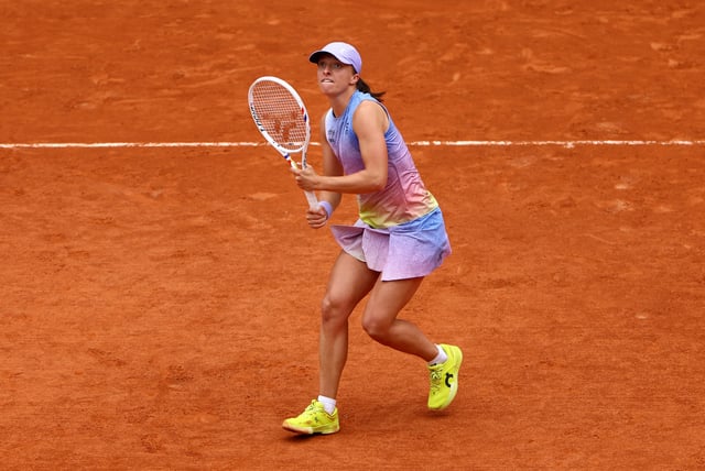 Tennis - French Open - Roland Garros, Paris, France - May 26, 2025 Poland's Iga Swiatek in action during her first round match against Slovakia's Rebecca Sramkova REUTERS/Lisi Niesner