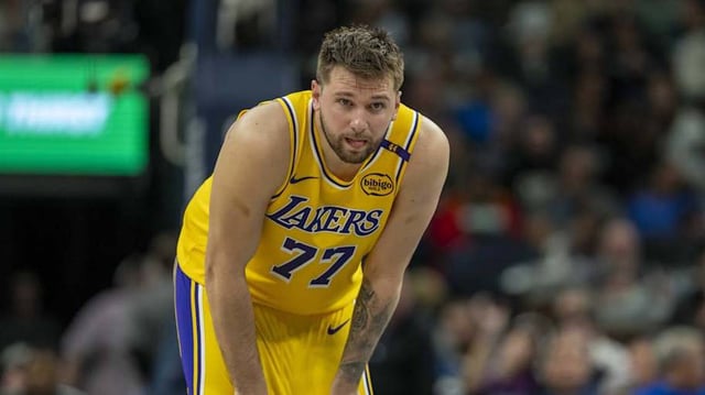 Los Angeles Lakers guard Luka Doncic (77) looks on against the Minnesota Timberwolves in the first half during game three of first round for the 2024 NBA Playoffs at Target Center.