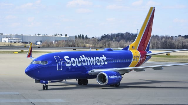 Southwest Airlines ends 50-year policy of free checked bags, implementing fees for many travelers starting Wednesday. (AP Photo/Gene J. Puskar, File)