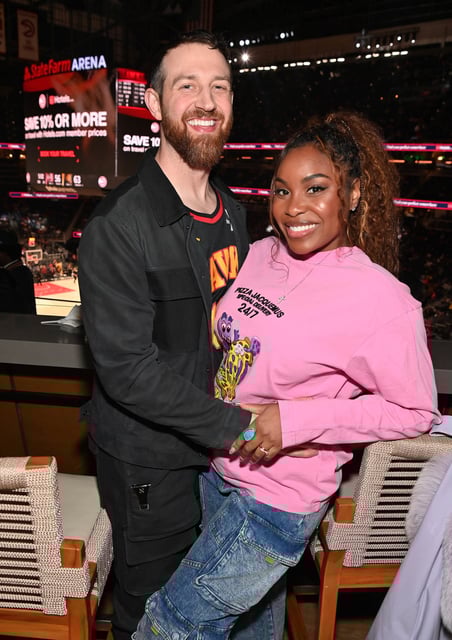 Cameron Hamilton and Lauren Speed-Hamilton attend the game between the Indiana Pacers and the Atlanta Hawks at State Farm Arena on March 6, 2025 in Atlanta, Georgia. 