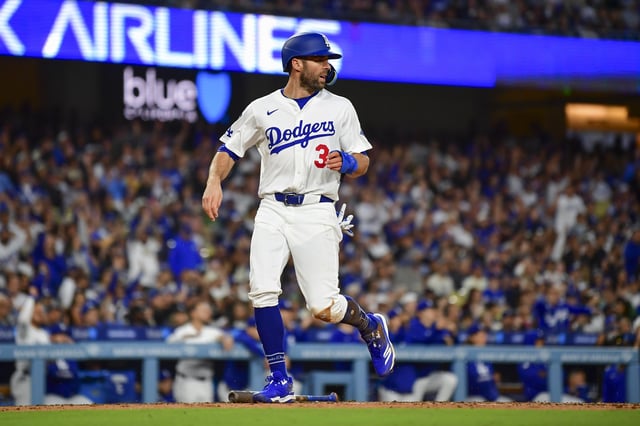 May 13, 2025; Los Angeles, California, USA; Los Angeles Dodgers outfielder Chris Taylor (3) scores a run in the third inning against the Oakland Athletics at Dodger Stadium. Mandatory Credit: Gary A. Vasquez-Imagn Images/File Photo