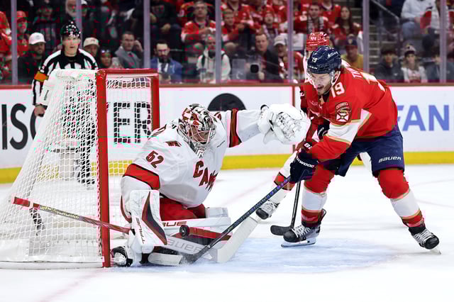 Pyotr Kochetkov #52 of the Carolina Hurricanes defends against Matthew Tkachuk #19 of the Florida Panthers during the first period in Game Three of the Eastern Conference Final of the 2025 Stanley Cup Playoffs at Amerant Bank Arena on May 24, 2025 in Sunrise, Florida.