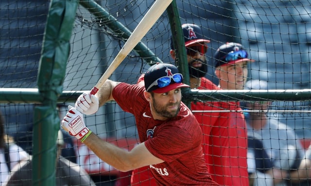 Angels utility man Chris Taylor takes batting practice before their game against the New York Yankees on Monday at Angel Stadium. The Angels signed Taylor on Monday. He was released by the Dodgers earlier this month. (AP Photo/Kevork Djansezian)