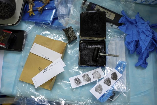 Fingerprints taken from the body of a Ukrainian prisoner of war returned by Russia, at a morgue in Kyiv, Ukraine, June 24, 2024. (AP Photo/Alex Babenko)