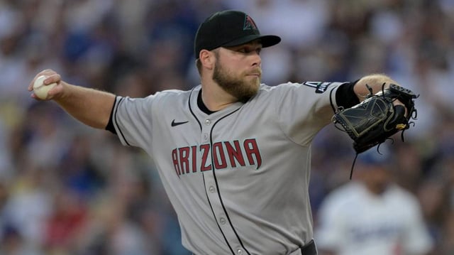 May 21, 2025; Los Angeles, California, USA; Arizona Diamondbacks pitcher Corbin Burnes (39) throws during the second inning against the Los Angeles Dodgers at Dodger Stadium. Mandatory Credit: Jayne Kamin-Oncea-Imagn Images
