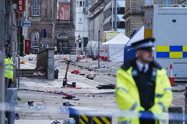 Police tents have been erected on Water Street overnight and officers stand guard around the site of the incident on Tuesday morning