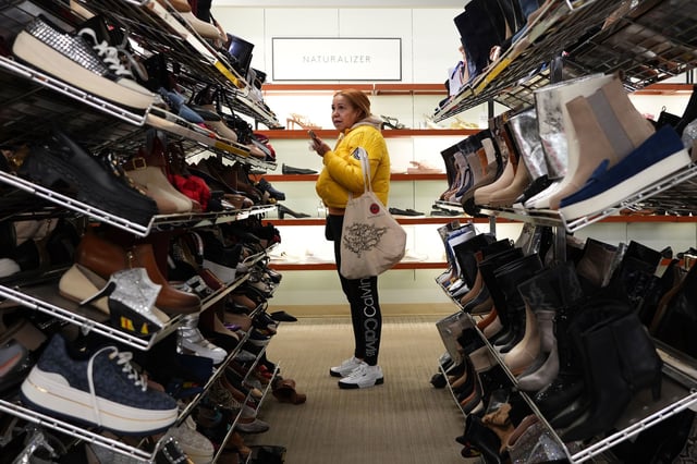 A customer shops at a department store in Queens on April 10 in New York City.
