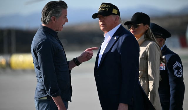 US President Donald Trump and First Lady Melania Trump are greeted by California Governor Gavin Newson upon arrival at Los Angeles International Airport in Los Angeles, California, on Jan. 24, 2025, to visit the region devastated by the Palisades and Eaton fires.
