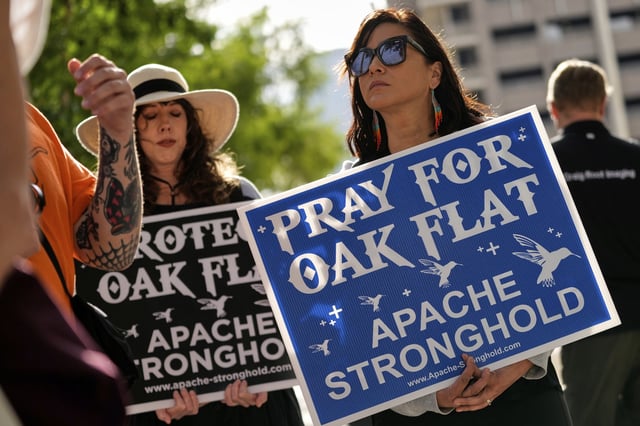 Members of Apache and others who want to halt a massive copper mining project on federal land in Arizona gather outside the U.S. District Court, May 7, 2025, in Phoenix.