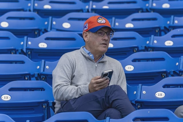 New York Mets owner Steve Cohen sitting in the stands during a spring training workout in Port St. Lucie, Florida on Feb. 17, 2025.