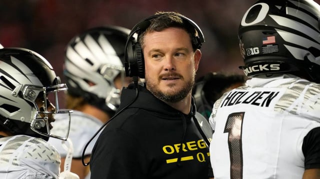Nov 16, 2024; Madison, Wisconsin, USA; Oregon Ducks head coach Dan Lanning looks on during the third quarter against the Wisconsin Badgers at Camp Randall Stadium. Mandatory Credit: Jeff Hanisch-Imagn Images