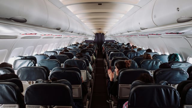 One country plans to issue fines to travellers who crowd the aisles after landing