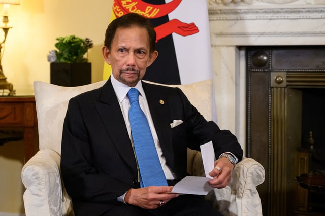 The Sultan of Brunei Hassanal Bolkiah meets with Britain's Prime Minister Keir Starmer (not pictured) during a meeting in 10 Downing Street on December 19, 2024 in London, England.  Leon Neal/Pool via REUTERS/File Photo