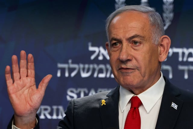 Israeli Prime Minister Benjamin Netanyahu speaks during a press conference, in Jerusalem, May 21, 2025. REUTERS/Ronen Zvulun/Pool/File Photo