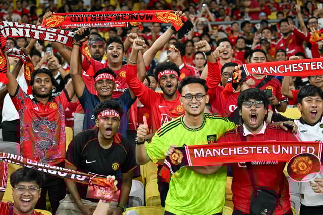 Fans before the friendly football match between Manchester United and  Asean All-Stars