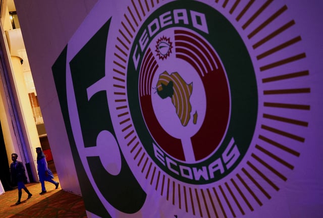 Students walk into the Eko Conventional Hall where leaders from the Economic Community of West African States (ECOWAS) will gather to celebrate the golden jubilee of the regional bloc in Nigeria's commercial capital, Lagos, Nigeria, May 28, 2025. REUTERS/Sodiq Adelakun