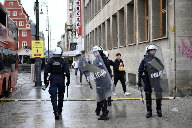 Polish riot police in Wroclaw after clashes between Chelsea and Real Betis fans