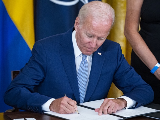 US President Joe Biden signs the Instruments of Ratification for the Accession Protocols to the North Atlantic Treaty Organization (NATO) for Finland and Sweden in the East Room of the White House in Washington, D.C., US, on Tuesday, Aug. 9, 2022. The US Senate this month ratified adding Sweden and Finland to NATO, a move intended to bolster the military alliance after Russia's invasion of Ukraine. Photographer: Al Drago/Bloomberg via Getty Images