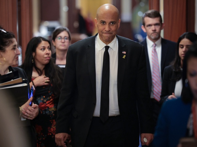 U.S. Sen. Cory Booker (D-NJ) walks toward reporters after delivering a record setting floor speech for the U.S. Senate at the U.S. Capitol on April 01, 2025 in Washington, DC. Booker spoke for over 25 hours, protesting President Trump’s agenda on the Senate floor, breaking a record set by Sen. Strom Thurmond’s 24 hour, 18 minute filibuster against the Civil Rights Act in 1957. (Photo by Win McNamee/Getty Images)