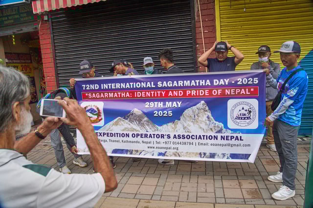 People from the mountaineering community gather to participate in a rally to mark the anniversary of the first ascent of Mount Everest in Kathmandu, Nepal, Thursday, May 29, 2025. (AP Photo/Niranjan Shrestha)