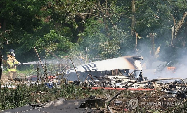 Authorities respond after a Navy patrol aircraft carrying four people crashed on a mountain in the southeastern port city of Pohang on May 29, 2025. (Yonhap) 
