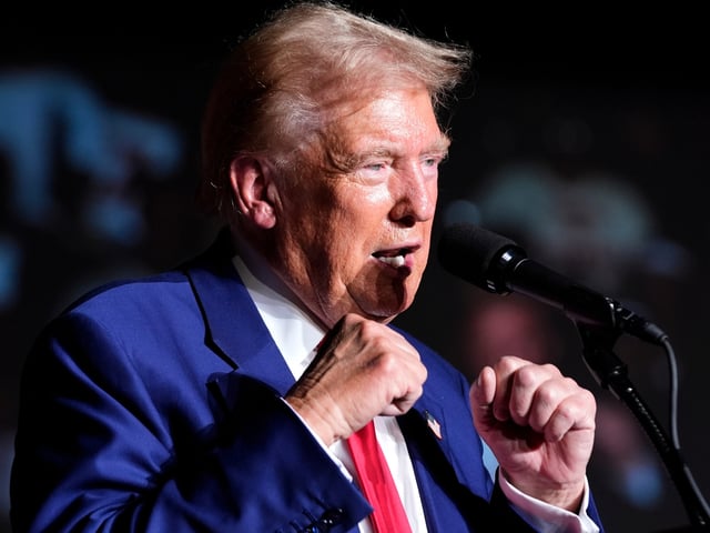 Republican presidential nominee former President Donald Trump gestures with his fists as he speaks during a campaign event at the World Market Center, Friday, Sept.13, 2024, in Las Vegas. (Alex Brandon/AP)