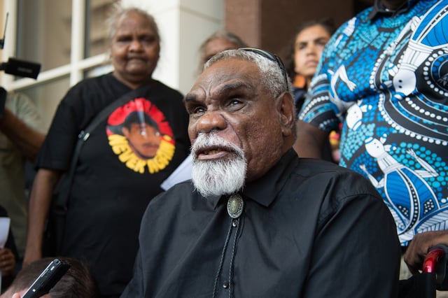 Warlpiri Elder from Yuendumu Ned Jampijinpa Hargraves speaks to the media outside the Northern Territory Supreme Court in Darwin, Friday, March 11, 2022. A jury has found Constable Zachary Rolfe not guilty of murdering Kumanjayi Walker after he fatally shot the Aboriginal teenager during an outback arrest. (AAP Image/Aaron Bunch) NO ARCHIVING