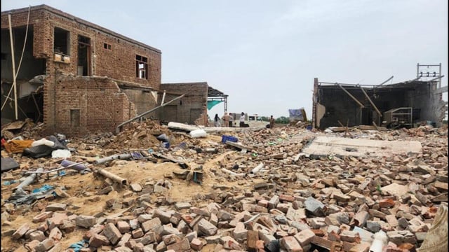 The two-storeyed illegal cracker manufacturing factory that was reduced to rubble after a blast at Singhewala village in Lambi sub tehsil of Muktsar district on Friday. (Sanjeev Kumar/HT)