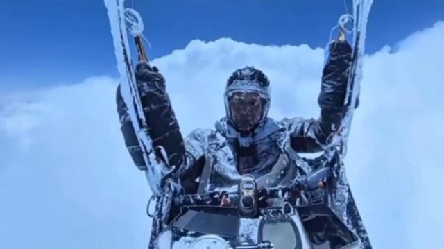 The video footage from Peng's glider showed him covered in ice
