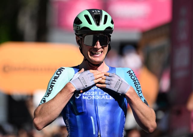 Cycling - Giro d'Italia - Stage 19 - Biella to Champoluc - Italy - May 30, 2025 Decathlon AG2R La Mondiale Team's Nicolas Prodhomme celebrates as he crosses the finish line to win stage 19 REUTERS/Jennifer Lorenzini