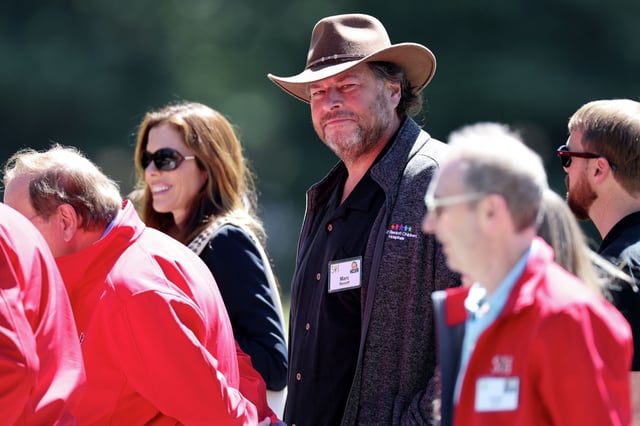 FILE: Marc Benioff, CEO of Salesforce, walks with other attendees as they leave a morning session at the Sun Valley Conference on July 12, 2023, in Sun Valley, Idaho. 