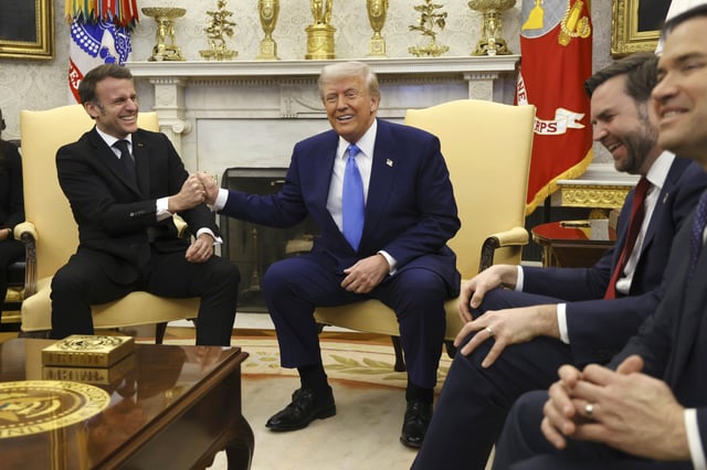 France&#39;s President Emmanuel Macron, from left, speaks with President Donald Trump as Vice President JD Vance and Secretary of State Marco Rubio react during a meeting in the Oval Office of the White House in Washington, Monday, Feb. 24, 2025.