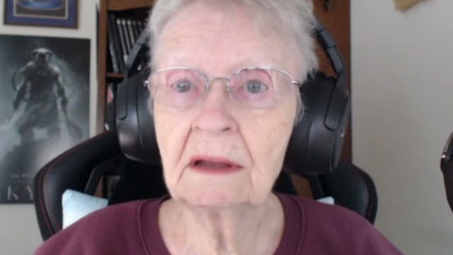skyrim grandma talking to viewers while wearing headphones