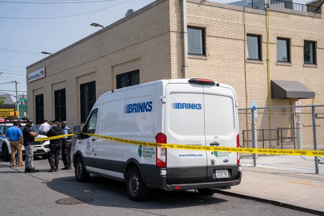 Two individuals, both armed with guns, approached the driver of a Brinks Armored Truck parked outside of a Bank of America at 205-02 Linden Boulevard in Queens on Monday June 2, 2025. 1033. The robbers then proceeded to remove an unknown quantity of United States currency from the back of the truck. The brazen robbers also forcibly removed the gun carried by a 62yr old male Brinks Security Officer before making their getaway in a Chevy vehicle westbound on Linden Boulevard. (Theodore Parisienne / New York Daily News)