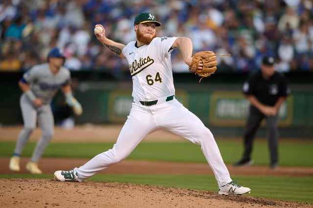 Aug 3, 2024; Oakland, California, USA; Will Klein (64) throws against the Los Angeles Dodgers during the sixth inning at Oakland-Alameda County Coliseum. Mandatory Credit: Robert Edwards-USA TODAY Sports