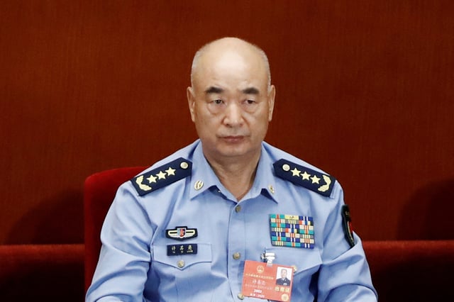 Xu Qiliang, vice chairman of the Central Military Commission, attends the second plenary session of the National People's Congress (NPC) at the Great Hall of the People in Beijing, China May 25, 2020. REUTERS/Thomas Peter/File Photo