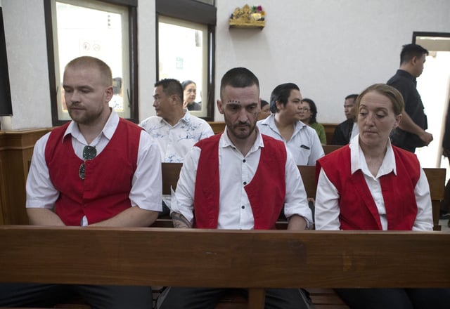 British nationals, from left, Phineas Float, Jonathan Collyer, and Lisa Stocker who are accused of smuggling nearly a kilogram (over two pounds) of cocaine into Indonesia sit inside the courtroom before the start of their trial hearing at Denpasar District Court in Denpasar, Bali, on Tuesday, June 3, 2025. (AP Photo/Firdia Lisnawati)