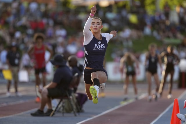 Transgender athlete AB Hernandez of Jurupa Valley competes in the girls triple jump during the CIF State Track and Field Championships at Veterans Memorial Stadium, Friday, May 30, 2025, in Clovis, Calif. (Kirby Lee via AP)