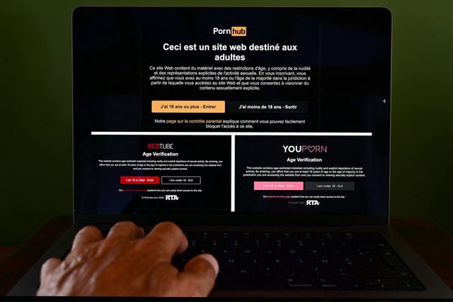 This photograph taken in Beziers, southern France, on June 4, 2025 shows the access pages of pornographic sites Pornhub, Youporn and Redtube. French visitors to the Pornhub and Youporn, adult sites operated by parent company Aylo, will be greeted with a message denouncing the country's age verification requirements, the company said.