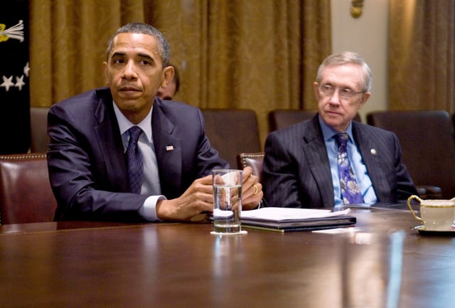 President Barack Obama (L) and Senate Majority Leader Harry Reid, (R) holds a bi-partisan meeting in the Cabinet Room of the White House on July 27, 2010 in Washington, D.C. Obama discussed climate legislation, and according to reports said the energy bill is making its way through Congress now, as he continues pushing for passage of a comprehensive energy policy addressing climate change.