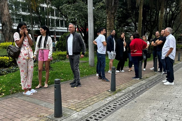 People, some still in their pyjamas, rushed into the streets as a powerful earthquake shook the Colombian capital of Bogota on June 8, 2025