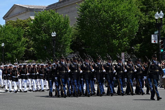 U.S. military units participate in the National Memorial Day Parade on Constitution Avenue in Washington, DC, May 26, 2025.