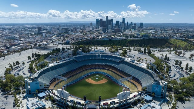 Los Angeles, CA - March 29: Storm clouds move out of the Los Angeles Basin in a view over Dodger Stadium, where tomorrow's night's opener looks dry on Wednesday, March 29, 2023 in Los Angeles, CA. (Brian van der Brug / Los Angeles Times)